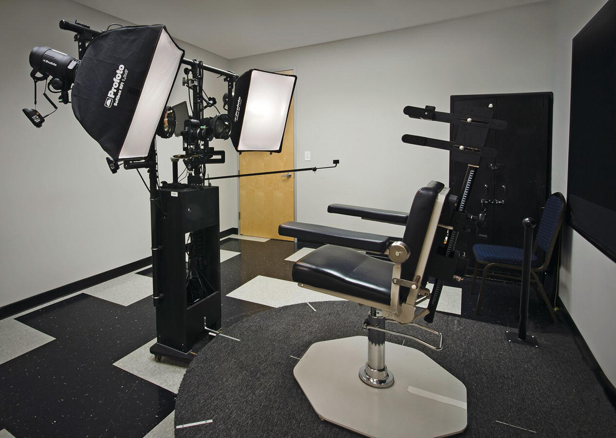 Photo depicts an example of SGS Stephens, Inc. photographic studio. The studio is equipped for taking photographs of face, neck, and décolleté using standard lighting, parallel polarized lighting, cross-polarized lighting, or raking light.