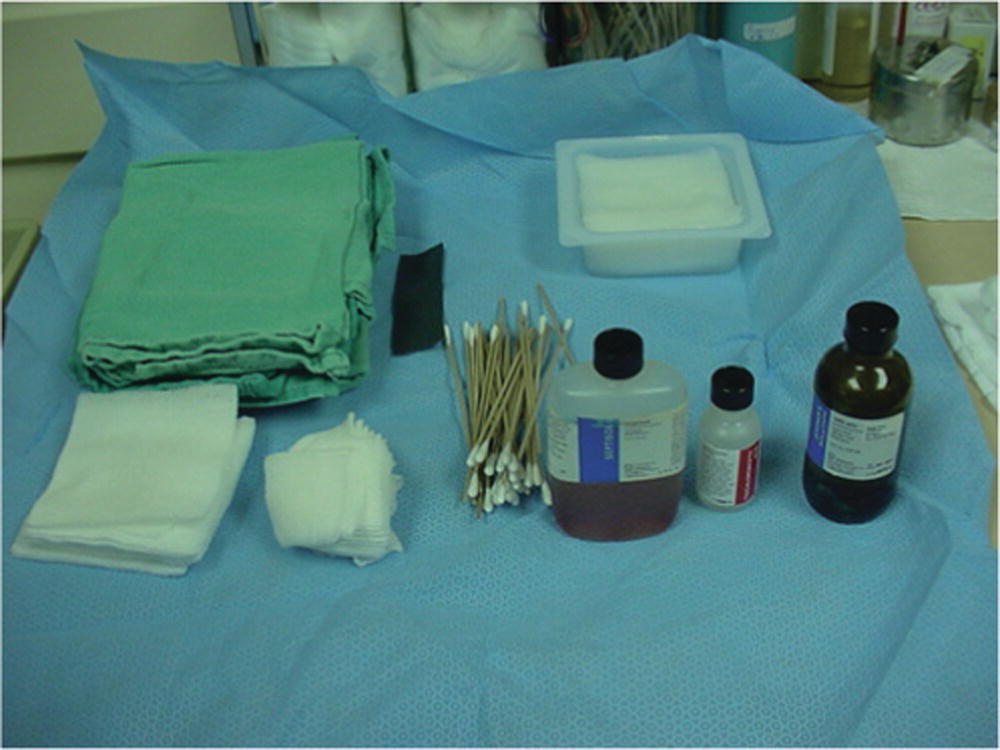 Schematic illustration of standard setup for Jessner’s and trichloracetic acid (TCA) combination peel. The standard setup includes a facial cleanser such as Septisol, acetone, Jessner’s solution, 35% TCA, cotton-tipped applicators, 2 × 2 inch and 4 × 4 inch gauze pads, and cool-water soaks for patient comfort.