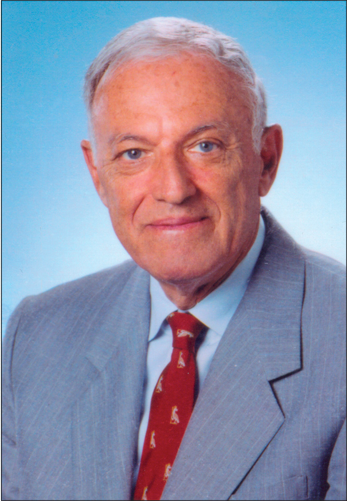 A photograph of Andrew M. Munster.