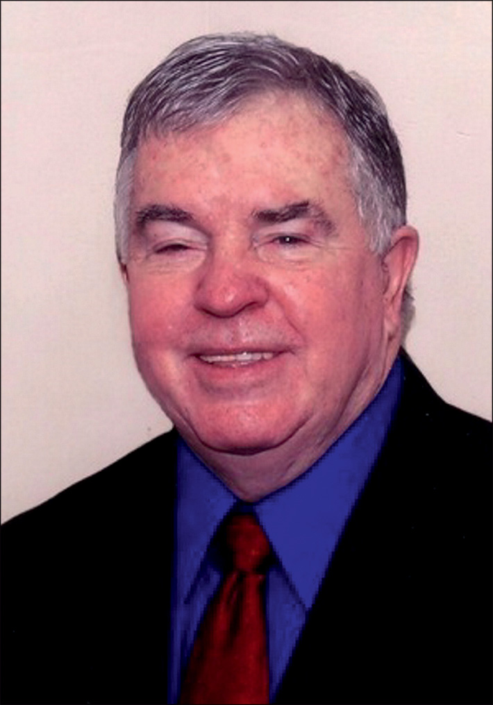 A photograph of J. Wesley Alexander in formal attire.