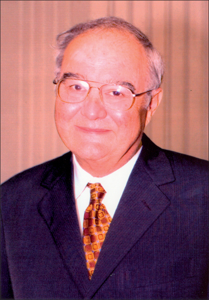 A photograph of P. William Curreri.